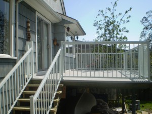vinyl decking contractor. vinyl deck. vinyl installer. tufdek vinyl dealer. tufdek contractor. strongest vinyl. aluminum handrail.